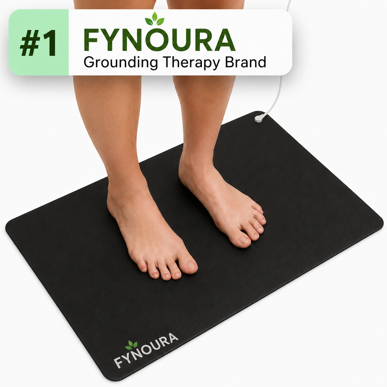 Bare feet standing on the Fynoura grounding mat